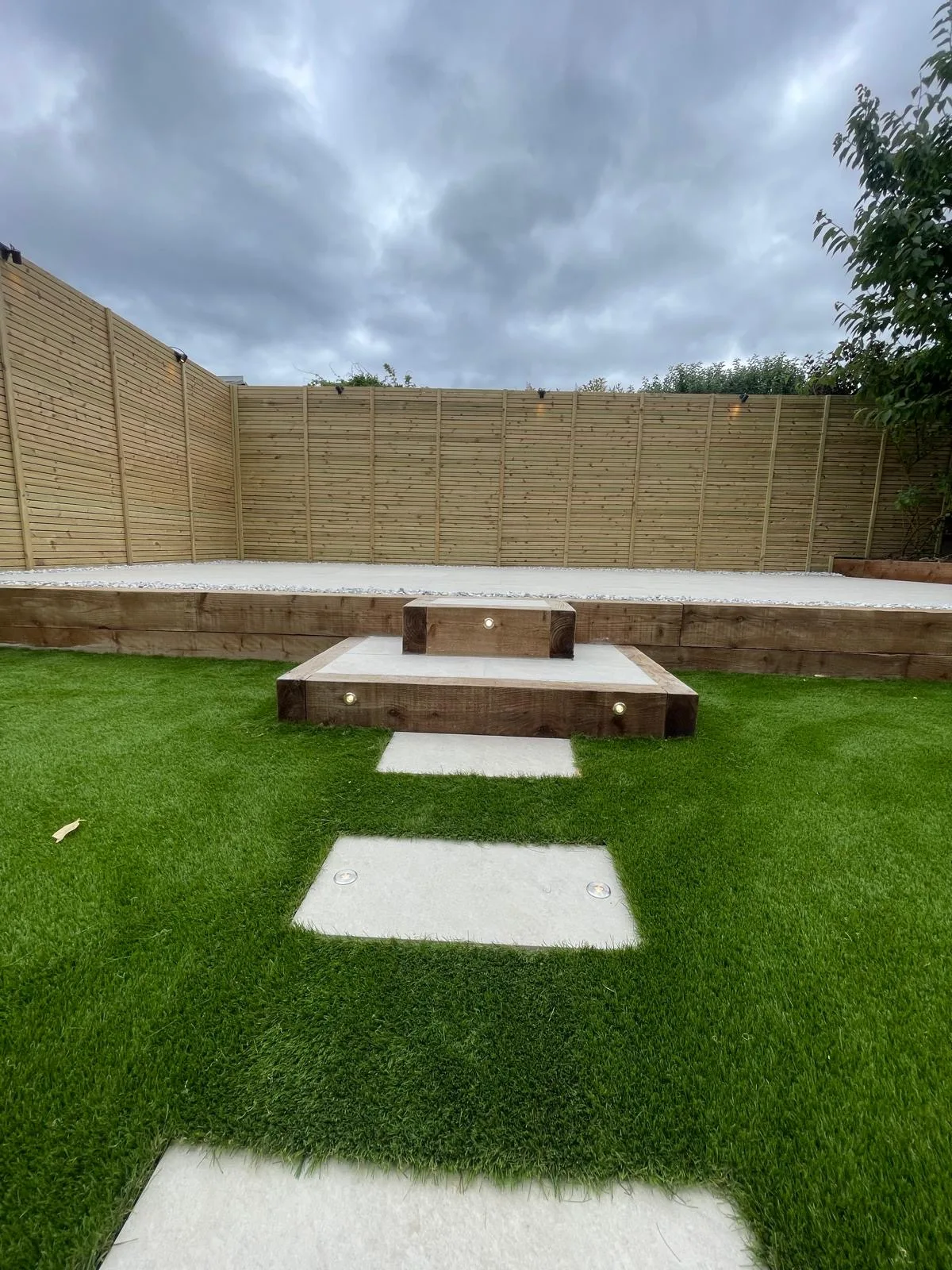 Landscaped garden with lawn